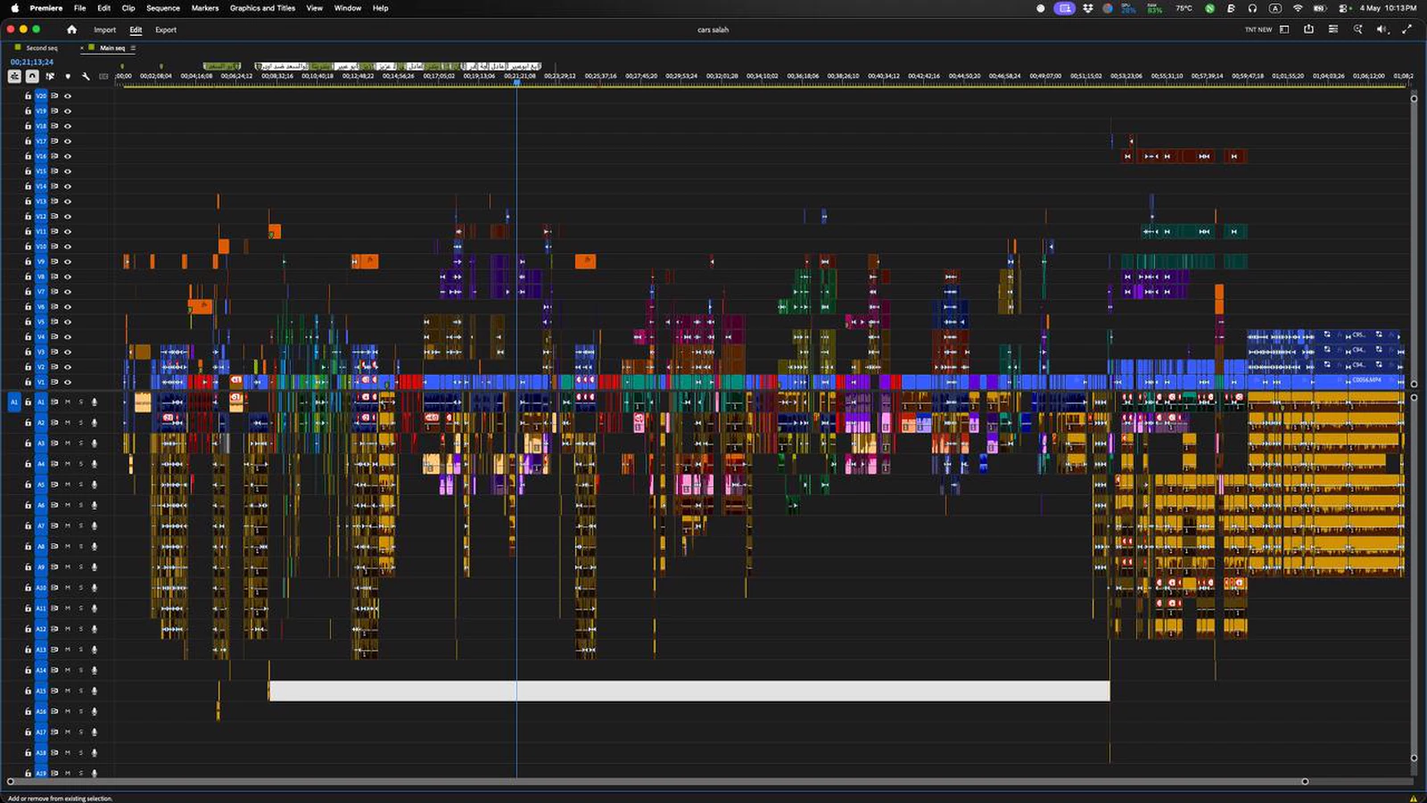 A Premiere Pro project sequence with dozens of stacked video and audio tracks
